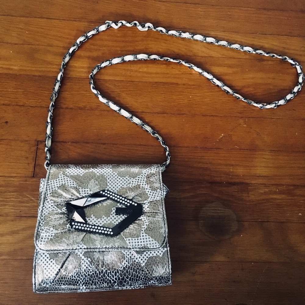 GUESS cross body purse.